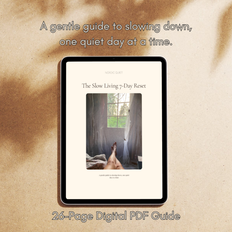 The 7-Day Slow Living Reset digital PDF guide displayed on an iPad.